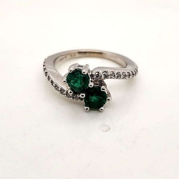 18Kt White Gold Toi Et Moi Bypass Emerald And Diamond Ring