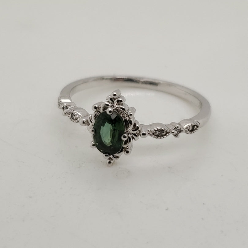 Platinum Green Sapphire And Diamond Ring