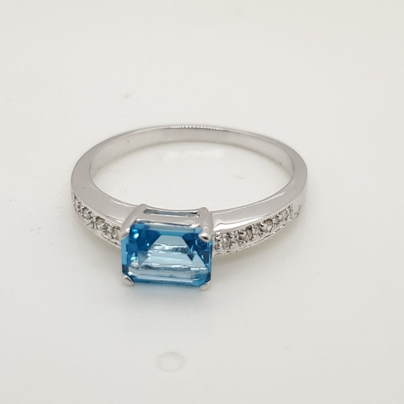14kt White Gold Blue Topaz and Diamond Ring