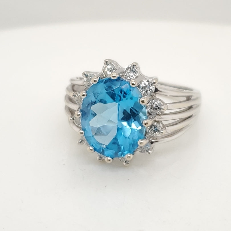 14kt White Gold Blue Topaz and Diamond Ring