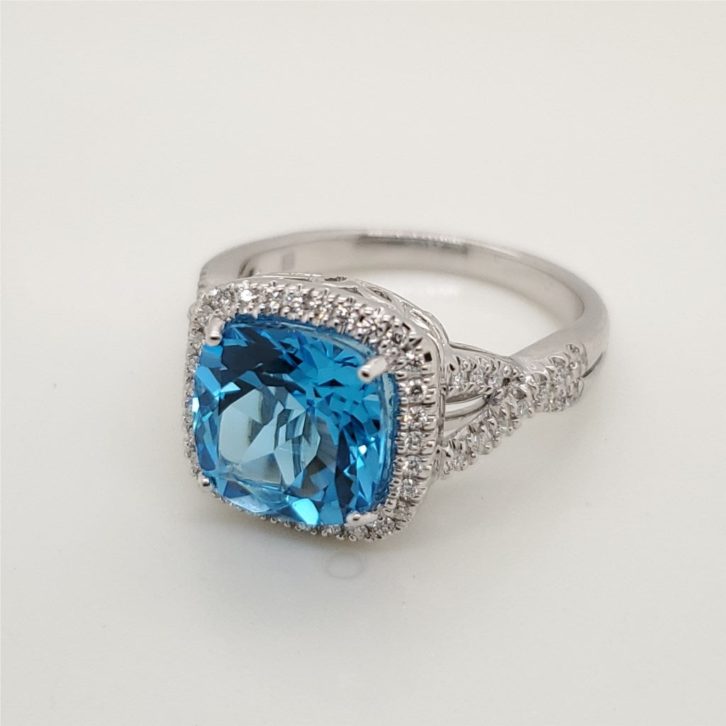 14kt White Gold Blue Topaz and Diamond Ring