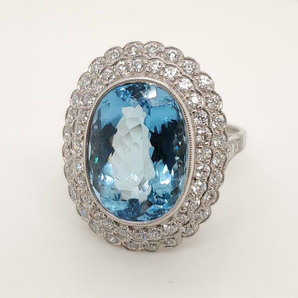 Platinum 7.08 Carat Oval Santa Maria Color Aquamarine and Diamond Ring
