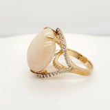Modern 18kt Yellow Gold Oval Opal and Diamond Ring