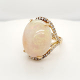 Modern 18kt Yellow Gold Oval Opal and Diamond Ring