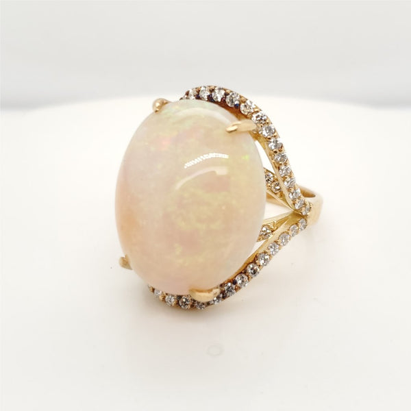 Modern 18kt Yellow Gold Oval Opal and Diamond Ring