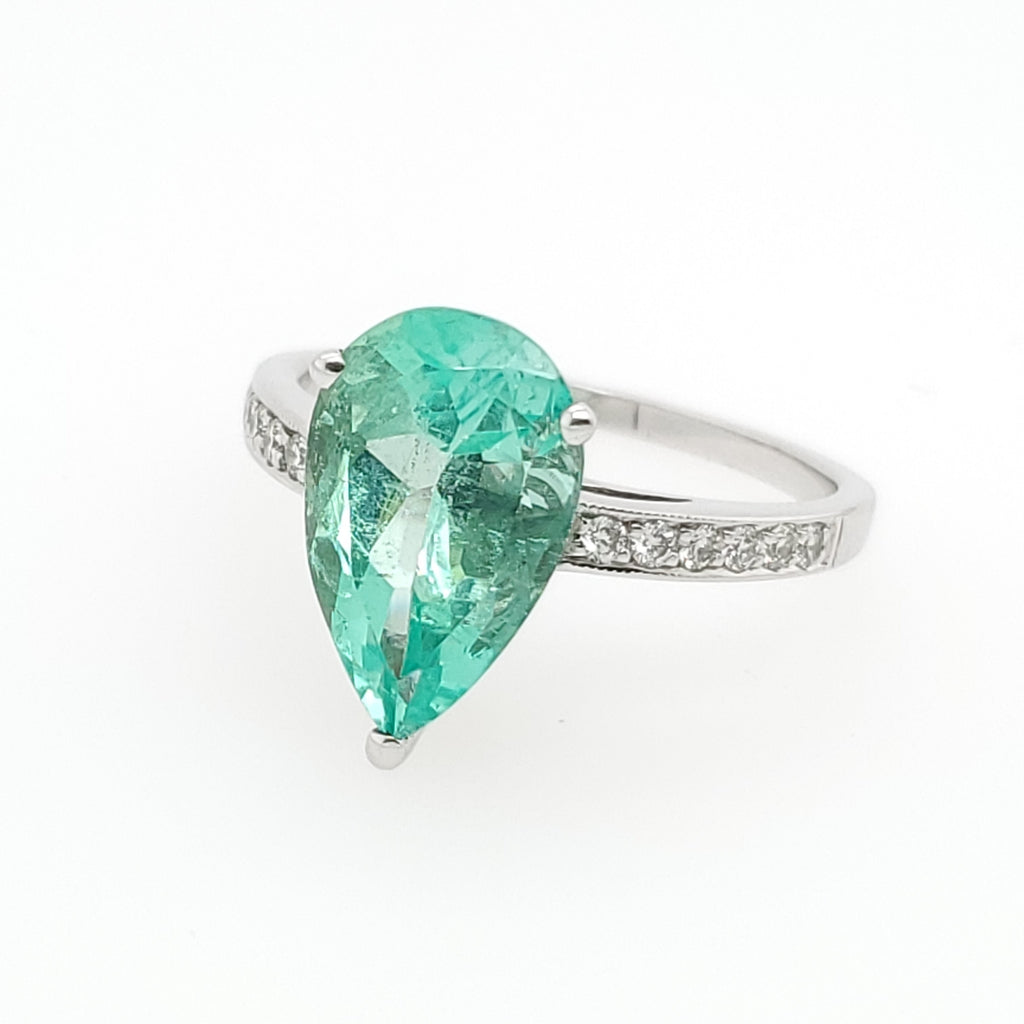 3.83 carat pear shape emerald and diamond ring.