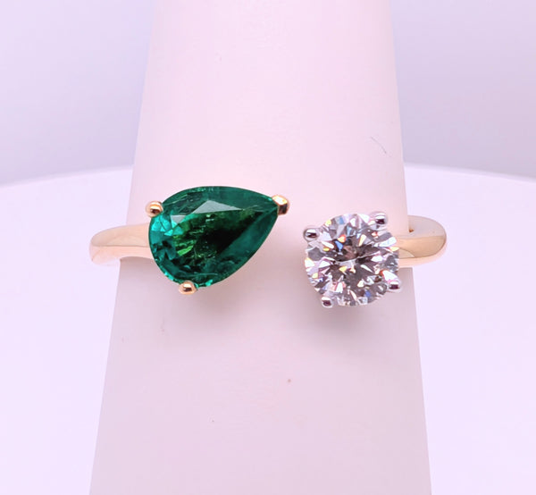 14K Yellow Gold Open Toi et Moi Ring with 0.61ct Pear Shaped Emerald and 0.40ct Round Brilliant Diamond