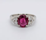 Platinum Ring with Oval Ruby and Round Brilliant Diamonds