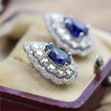 18kt White Gold 4.63Ctw Sapphire And Diamond Pear Shape Earrings