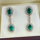 2.88 Ctw 14kt Yellow Gold Oval Emerald And Diamond Dangle Earrings