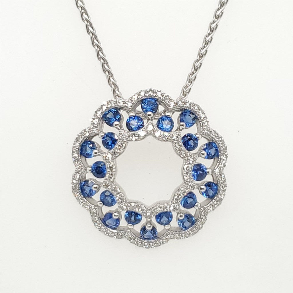 14Kt White Gold Sapphire And Diamond Pendant.