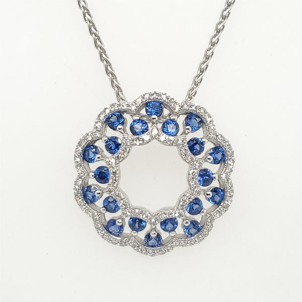 14Kt White Gold Sapphire And Diamond Pendant.