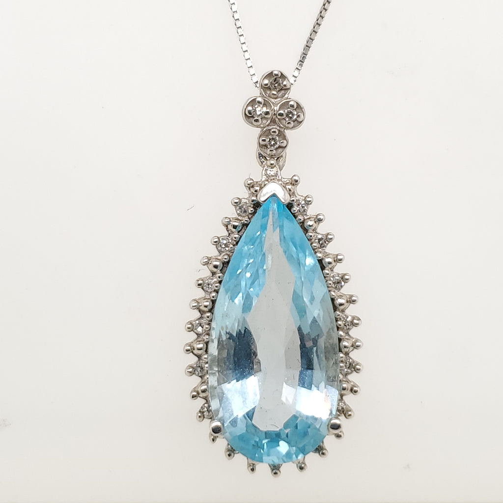 14kt White Gold Blue Topaz and Diamond Pendant Necklace