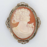 VICTORIAN CAMEO W/SEED PEARL RIM BROWN. LADIES HEAD 9.9 GR ETX