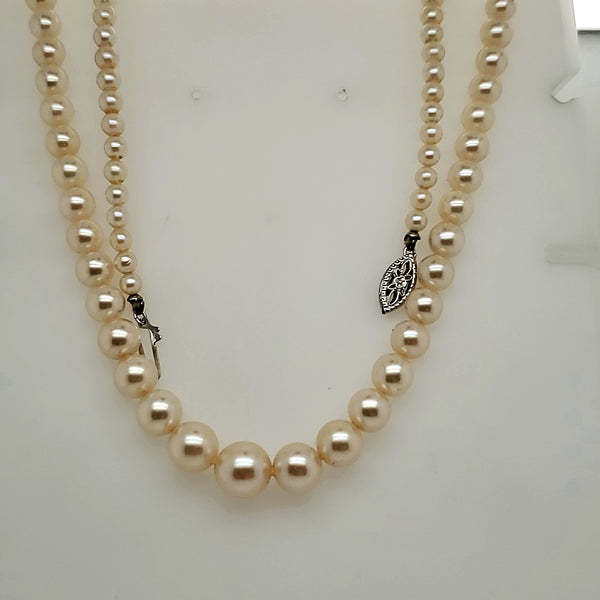 Graduated 2-8mm Cultured Akoya Pearl Necklace Measuring 28"" long