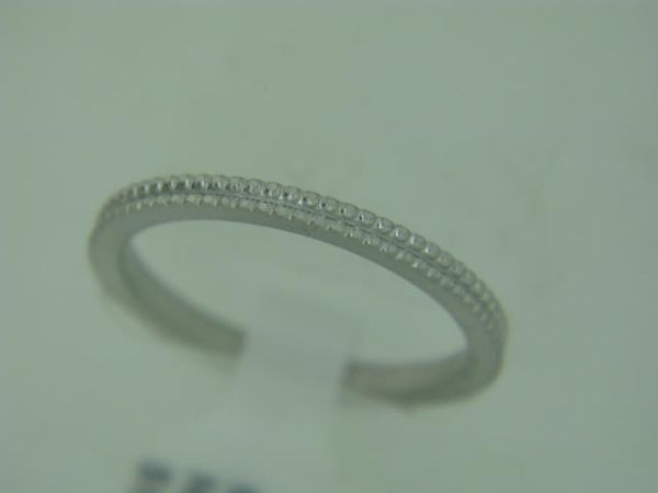 14kt white gold stackable wedding band by Novell