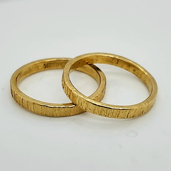 One Pair of 22kt yellow Gold Textured Wedding Bands