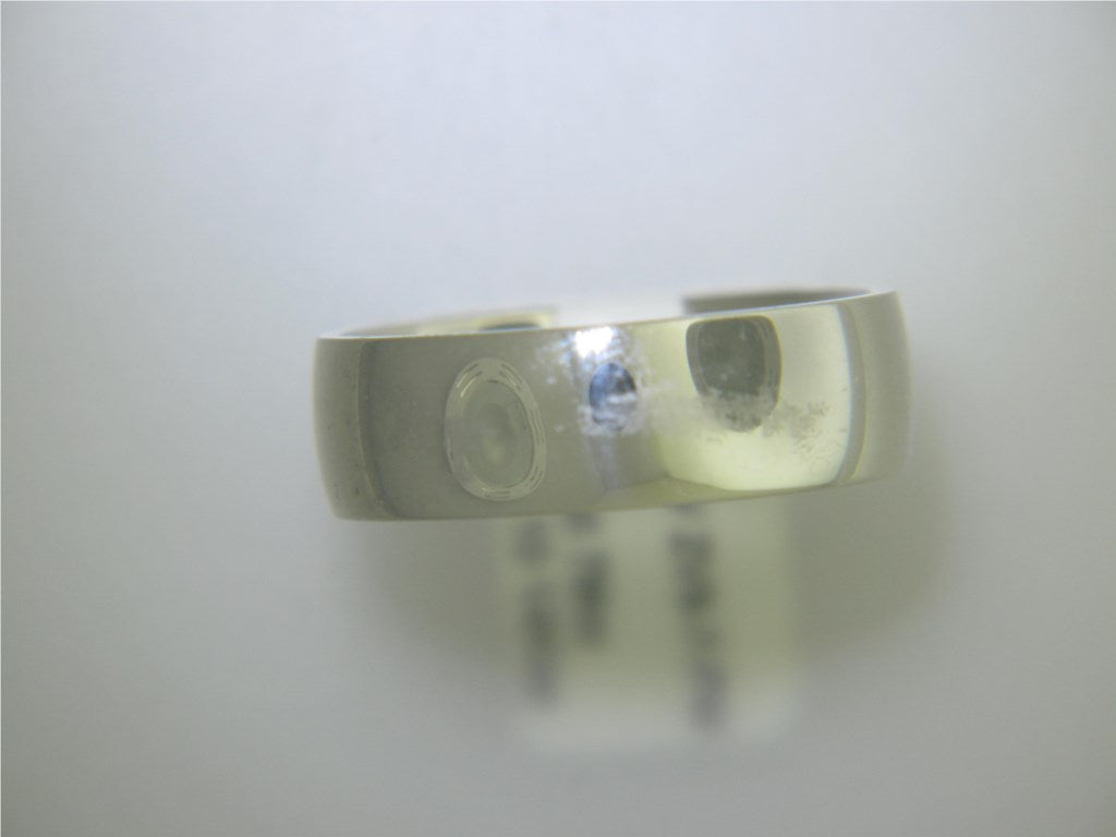 14kt white gold wedding band by Noval.