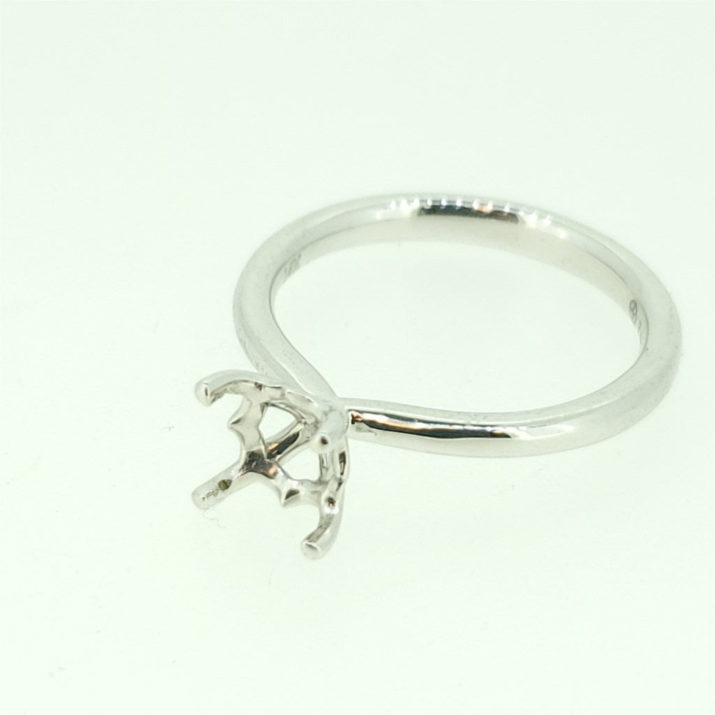 CZ CENTER. 14kt white gold semi-mount bridal ring by Fana.