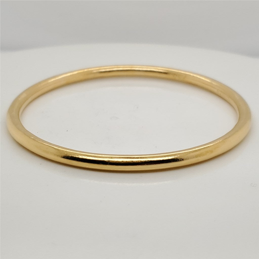 Carolyn Tyler 22Kt Gold Bangle Bracelet