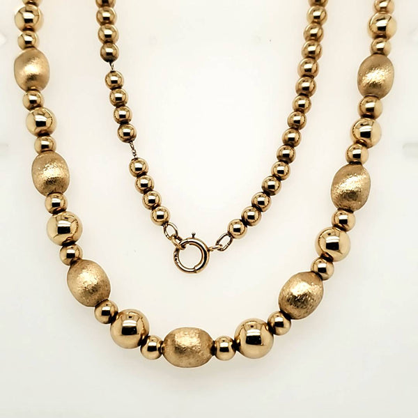 24"" 14Kt Yellow Gold Alternating Bead Necklace.