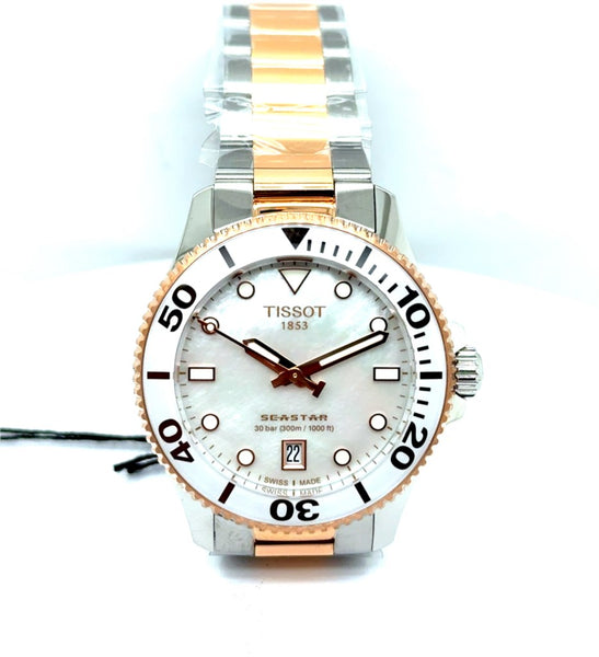 Tissot Seastar 1K Watch Stainless Steel Case/ Bracelet With Rose PVD And White Quartz Movement White Bezel/ Mother of Pearl Dial Sapphire Crystal T1202102211100