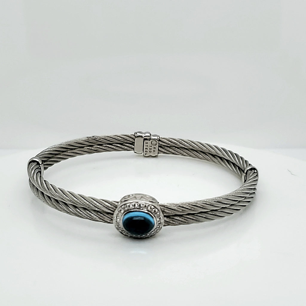 Charriol Flamme Blanche Oval Blue Topaz  .15 Carat Total Weight Diamond Bangle Bracelet